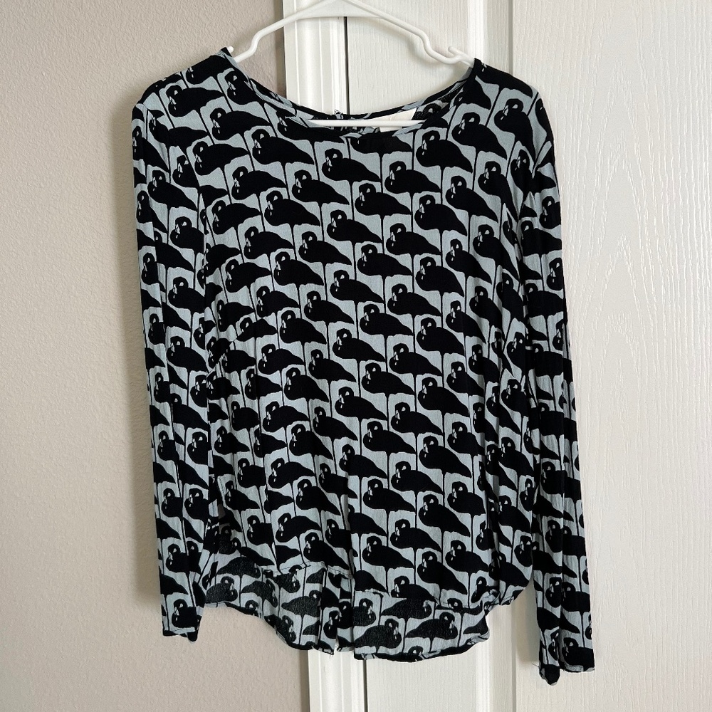 Flamingo print black and gray long sleeve blouse with buttons up the back